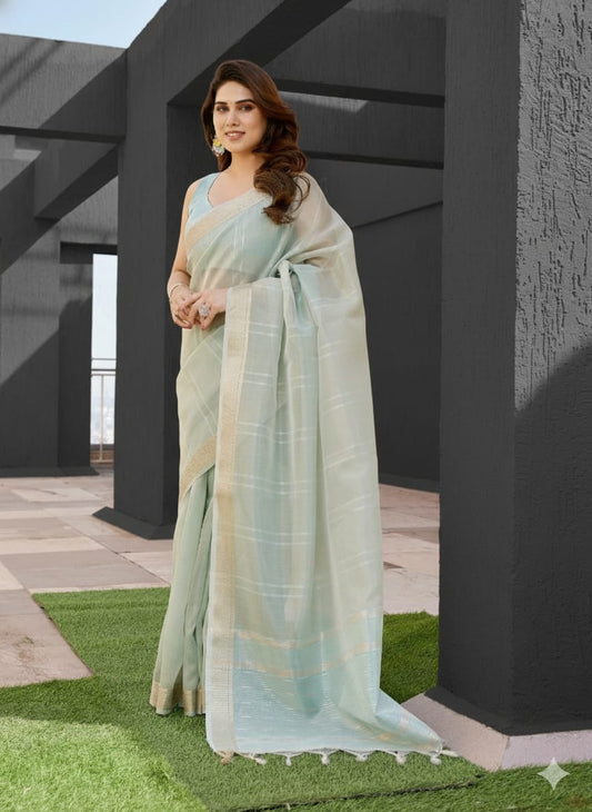 TISSUE LINEN SILK AND WEAVED ZARI LINING SAREE